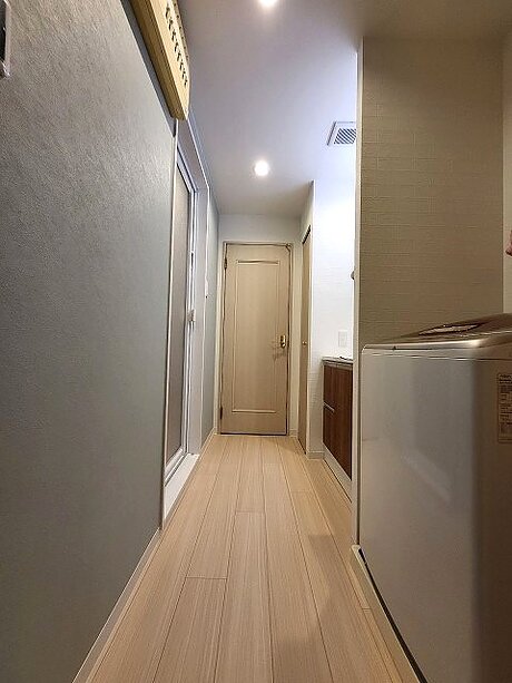 【福岡市博多区】水回りに強いクロスとクッションフロアで洗面所内装リフォームのアフター画像