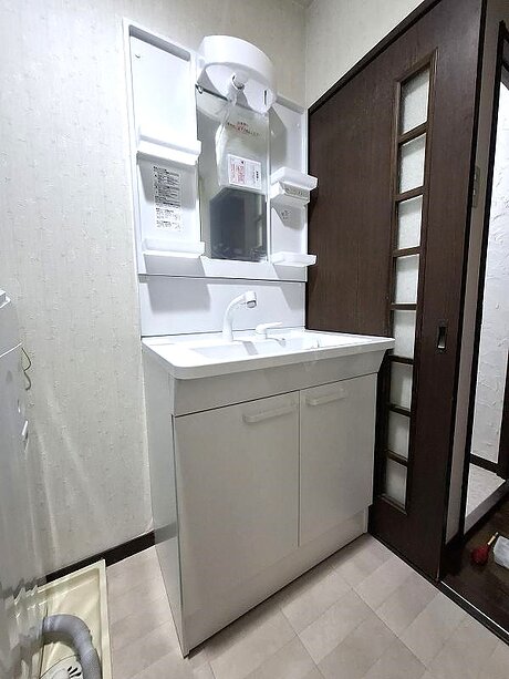 お手入れ簡単＆収納力が魅力的な洗面化粧台のアフター画像