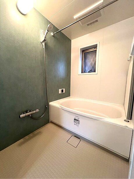ミントカラーを取り入れたリラックスできる浴室のアフター画像