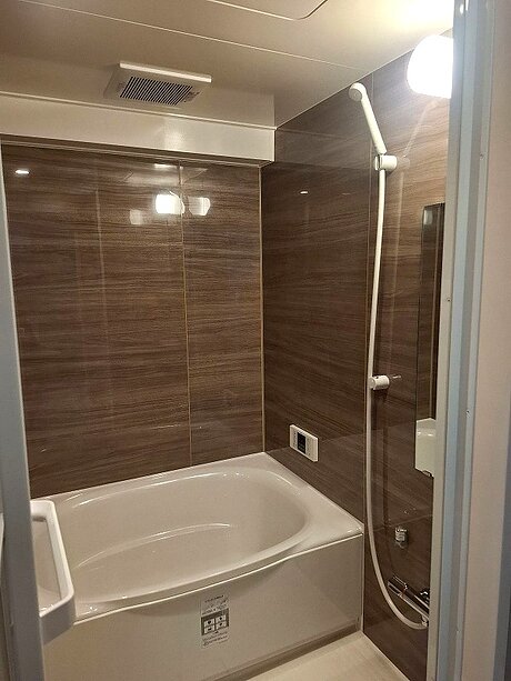 落ち着いたウォールナット柄で上質空間にのアフター画像