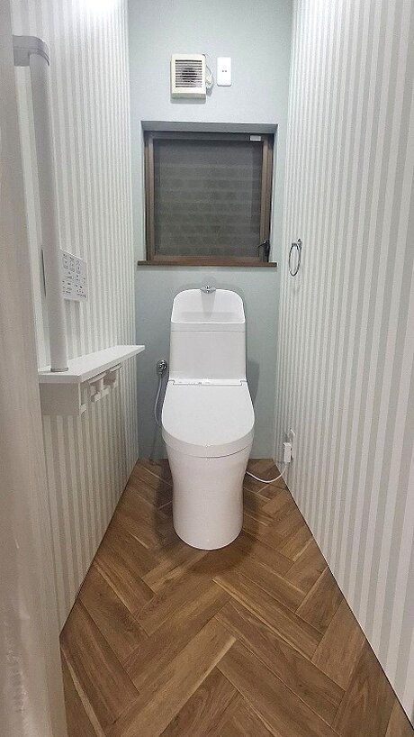 収納＆手すり付きで使いやすいトイレ空間へのアフター画像