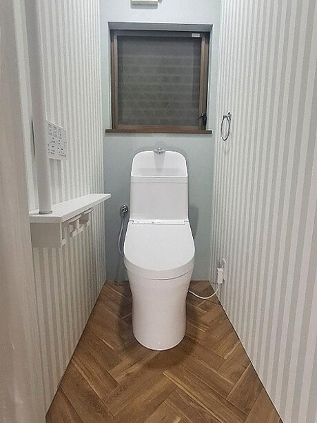 収納＆手すり付きで使いやすいトイレ空間へのアフター画像